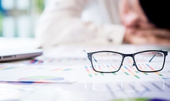 Glasses on paper